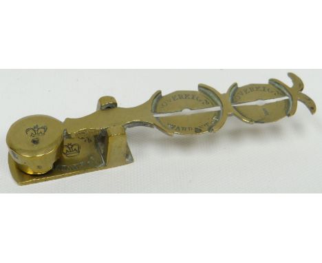 A set of pocket-size antique brass sovereign scales