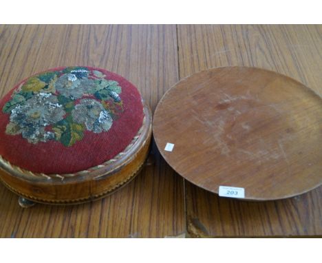 A Victorian footstool having tapestry top together with a mid 20th Century lazy Susan.