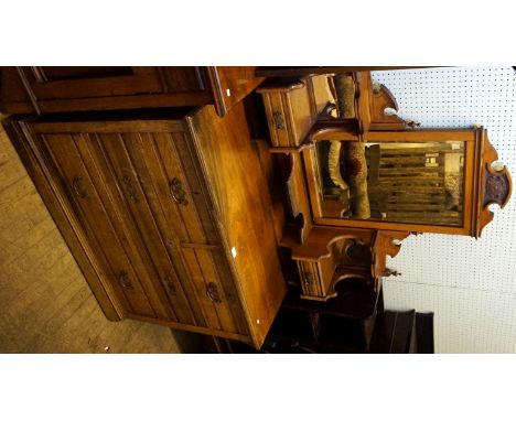 A Victorian mirrored back dressing table having an assortment of six drawers.