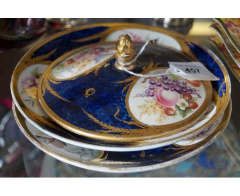 A pair of Worcester hand-painted scale blue tureen stands Each of circular form, decorated with exotic butterfly in landscape