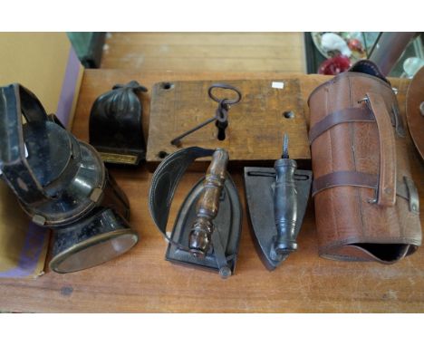 A mixed lot to include railway lamp, a cast iron newspaper bracket, vintage lock and key, etc.