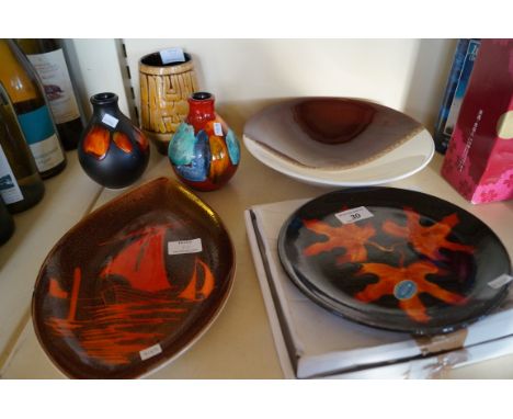 Six pieces of Poole Pottery to include Aegan sphere bowl, Delphis style vases etc.