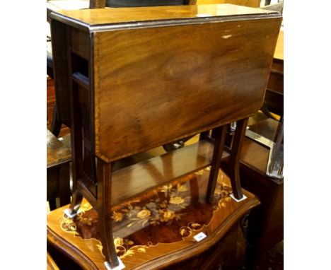 An Edwardian inlaid mahogany Sutherland table