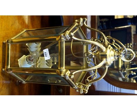A brass hexagonal ceiling lamp together with a further cylindrical example.
