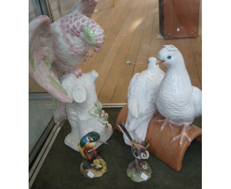 An Italian ceramic model depicting two doves perching a further similar example etc.