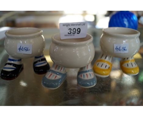 Three Carltonware walking ware egg cups