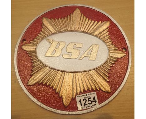 Cast iron red BSA sign, D: 24 cm. P&amp;P Group 1 (£14+VAT for the first lot and £1+VAT for subsequent lots)
