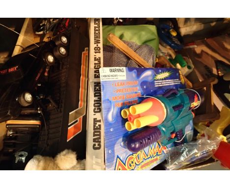 Shelf of mixed childrens toys including water pistols etc. Not available for in-house P&amp;P, contact Paul O'Hea at Mailboxe