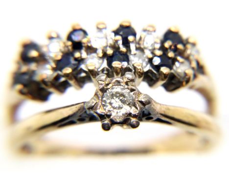 Two 9ct ladies rings, one with two rows of alternating diamonds and sapphires, the other a solitaire diamond approximately 1/