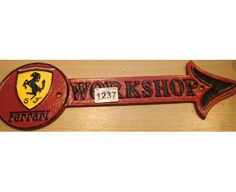 Cast iron Ferrari workshop sign, L: 41 cm. P&amp;P Group 1 (£14+VAT for the first lot and £1+VAT for subsequent lots)