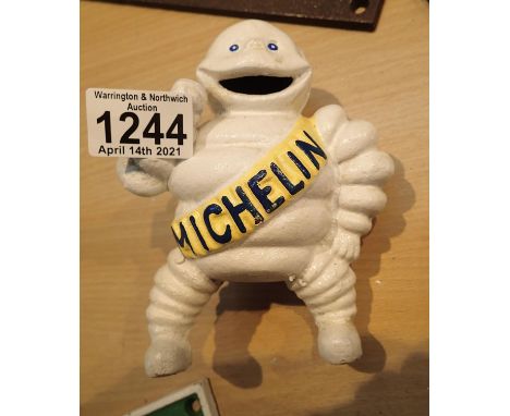Cast iron standing Michelin Man money box, H: 15 cm. P&amp;P Group 1 (£14+VAT for the first lot and £1+VAT for subsequent lot