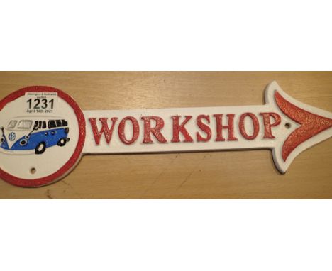 Cast iron Volkswagen sign, L: 41 cm. P&amp;P Group 1 (£14+VAT for the first lot and £1+VAT for subsequent lots)