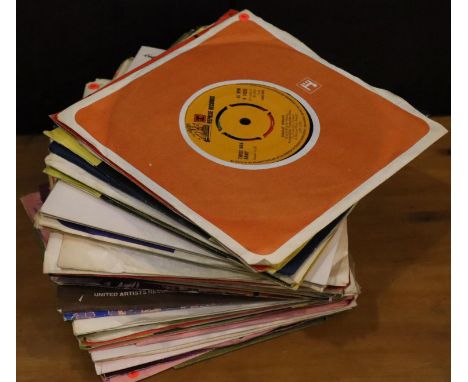 Approximately 60 rock singles including Hendrix Free and T Rex. P&amp;P Group 2 (£18+VAT for the first lot and £3+VAT for sub