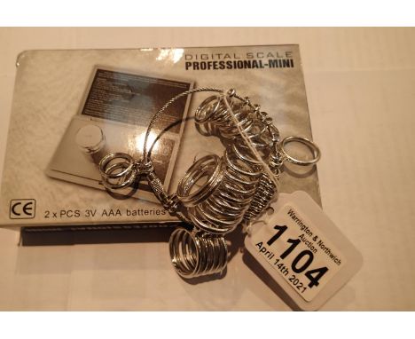 Complete set of stainless steel finger ring sizers and a boxed set of jewellers scales. P&amp;P Group 1 (£14+VAT for the firs