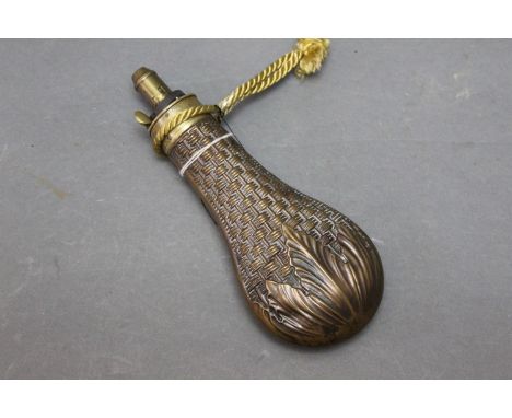 Copper and brass powder flask, with Dicksons basket pattern with leaves.  20 cm. 