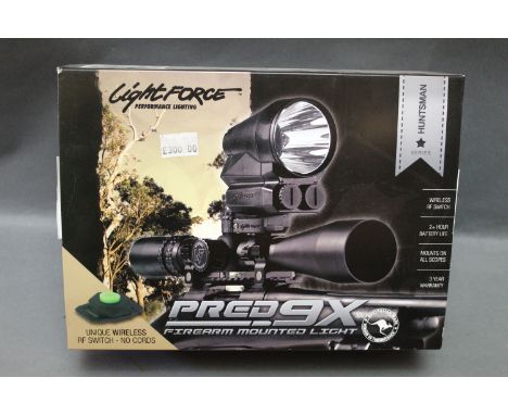 Light force Pred 9X firearm mounted light, new in box.