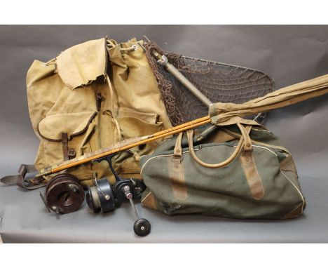 Two vintage bags containing fishing tackle and reels, to include a Garcia Mitchell 488, a landing net and a Milbro split cane