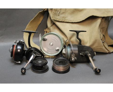 A Vintage tackle bag filled with tackle, containing a Noris Nurnberg fly reel, a Quick-O-Mat stationery drum bait casting ree