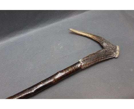 Hazel shaft walking stick, with stag antler handle.  133 cm.