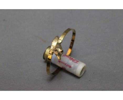 Gold plate on silver bangle in the form of a fox's head and brush, Birmingham 1978.  Weight 22.6 grams. 
