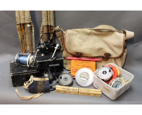 A Brady vintage fishing bag, together with two split cane fishing rods, Hardy rod bag, Mitchell Garcia 306 fixed spool reel, 