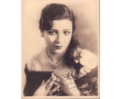 Sepia toned portrait on screen texture photo paper depicting Mexican Vaudeville performer and actress Lupe Velez.Maria Guadal
