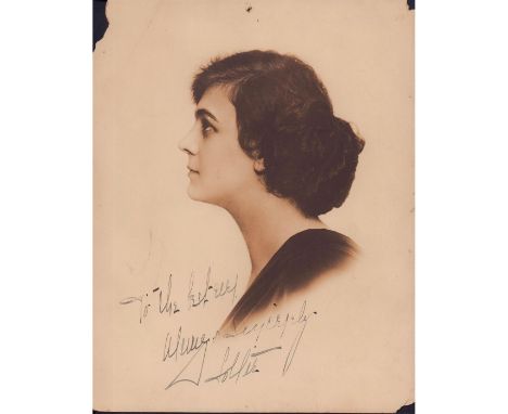 Portrait of Lottie Briscoe, an American stage and silent screen actress who started performing from the age of four.Hand sign