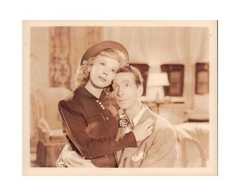 Horizontal portrait of American actor Gilbert L. Lamb (June 14, 1904 â€“ November 2, 1995).In photo, Gil sits and looks upwar