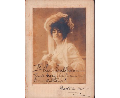 Antique albumen print of dark haired woman in white dress and hat holding a bouquet.Legible handwritten text reads, To Peter 