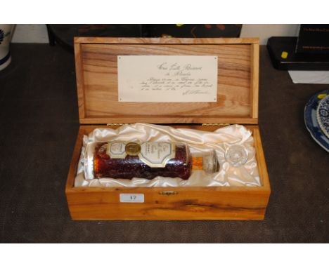 A boxed bottle of Cognac Le Heraud