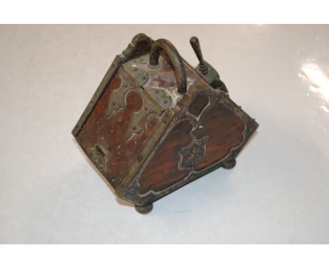 A novelty oak and silver plate mounted tea caddy modelled as a coal scuttle bearing registration mark 2669 and initialled B&O