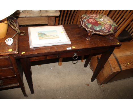 A hardwood console table fitted single drawer raised on square tapered supports