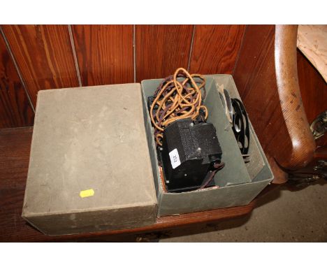 A Pathescope projector and film with original box - sold as a collector's item