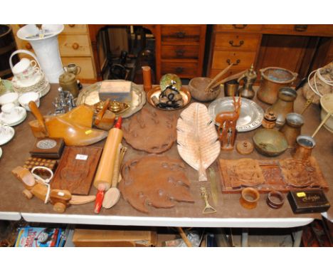 A large quantity of wooden and metal ware to include leaf trays, shoe lasts, a silver plated tray, pull-a-long toy dog, trink