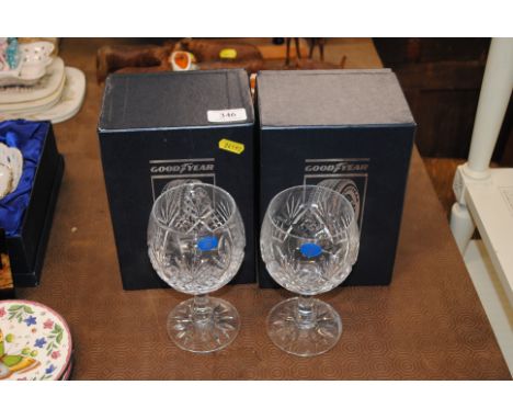 Two boxes of Goodyear crystal glasses