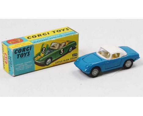 A Corgi Toys No. 319 Lotus Elan Coupe comprising of blue body with white roof and cream interior with cast hubs, housed in th