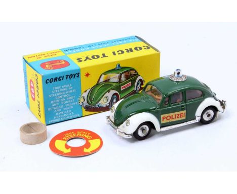 Corgi Toys No. 492 Volkswagen Beetle European police car comprising of dark green and white body with blue roof light and two