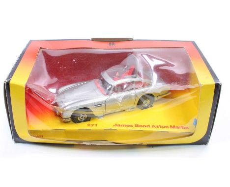 Corgi Toys No. 271, James Bond Aston Martin DB5, silver body with red interior, with 1 bandit figure, in the original orange,