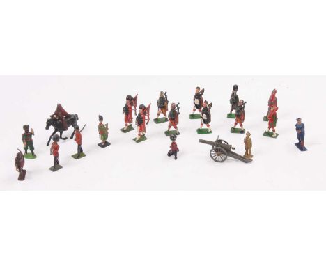 Tray of various lead hollowcast figures to include Highlanders, Britains Bag Pipe Players and others