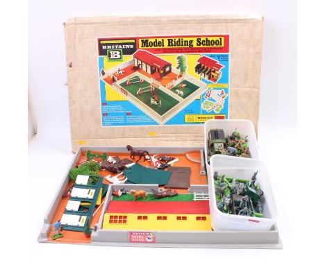 A Britains collection to include, No. 4714 Model Riding School to include layout, buildings together with horses and rider fi