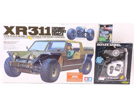 A Tamiya model no. 58004 1/12th scale radio controlled XR311 Combat Support Vehicle, model as issued with parts still sealed 