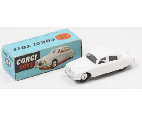 Corgi Toys, 208 Jaguar 2.4 litre, white body with silver detailing, flat spun hubs with glazing, in the original all-card blu