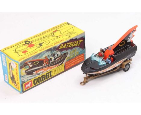 Corgi Toys No. 107 Batboat And Trailer, 1st issue with tinplate fin complete with Batman &amp; Robin figures, gold trailer, c