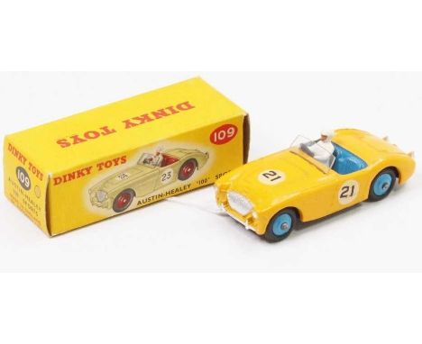 Dinky Toys No.109 Austin Healey 100 sports car comprising yellow body with blue interior and blue hubs, and with driver figur