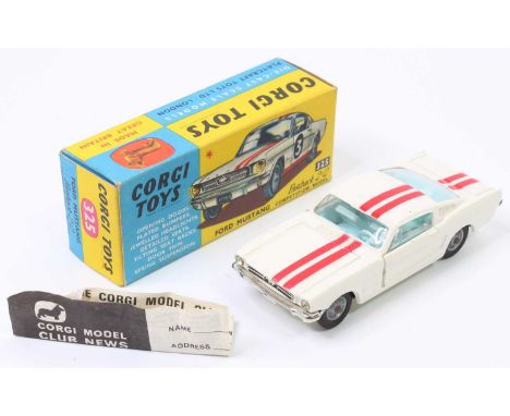 Corgi Toys No. 325 Ford Mustang Fastback 2+2 competition model, comprising of white body with red twin racing stripe, light b