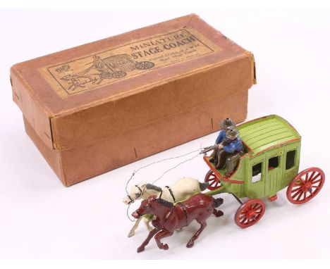A John Hill and Co Johillco boxed miniature Stage Coach comprising of a green coach with red wheels, running horses and two s
