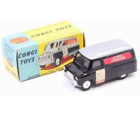 A Corgi Toys No. 421 Bedford 12 cwt Evening Standard delivery van comprising of black and silver body with Evening Standard l