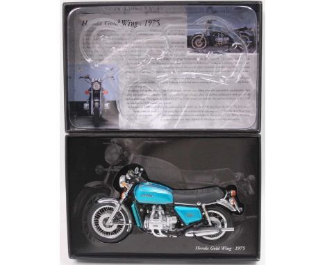 A Minichamps Classic Bike Series No. 44 Model No. 161600 1/12 scale model of a Honda Gold Wing 1975 in metallic blue, appears