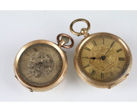 14ct gold open face fob watch having an engine turned dial with roman numerals to the chapter ring and floral engraved case. 