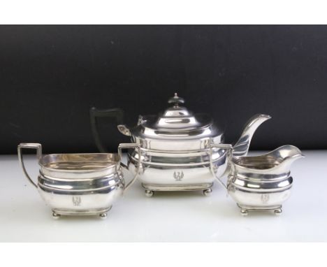 Early 20th Century William Hutton &amp; Sons silver hallmarked tea set consisting of teapot, sugar bowl and cream jug, all ra